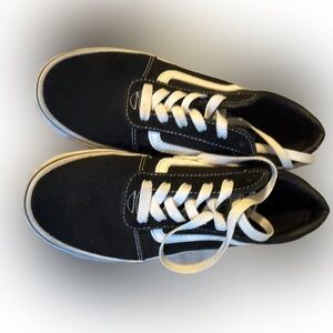Classic Black and White Vans Sneakers